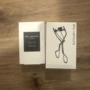 two Shu Uemura eyelash curlers